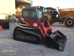 Used Takeuchi in yard